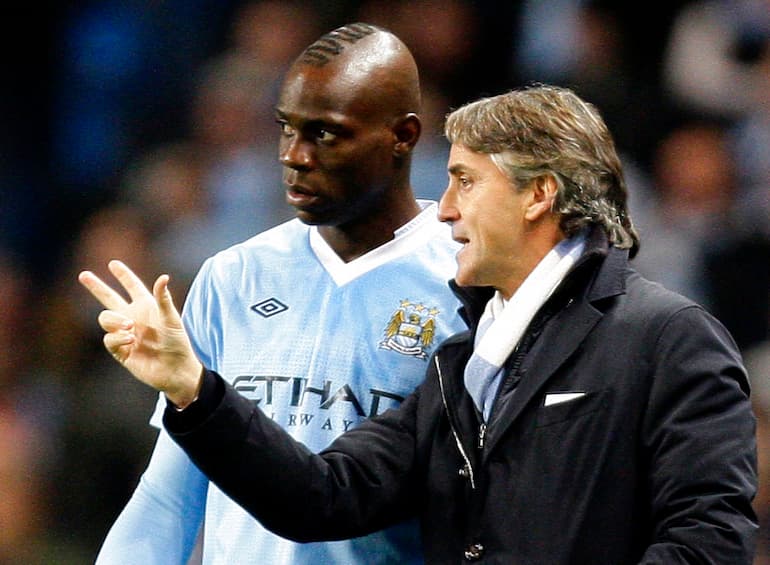 Balo con la maglia del City